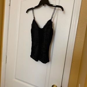 Black Bebe camisole with 100% silk contrast